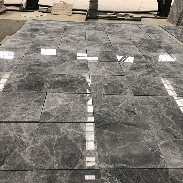 What are the various color options available in marble tiles, and how can one select the right color for their space?